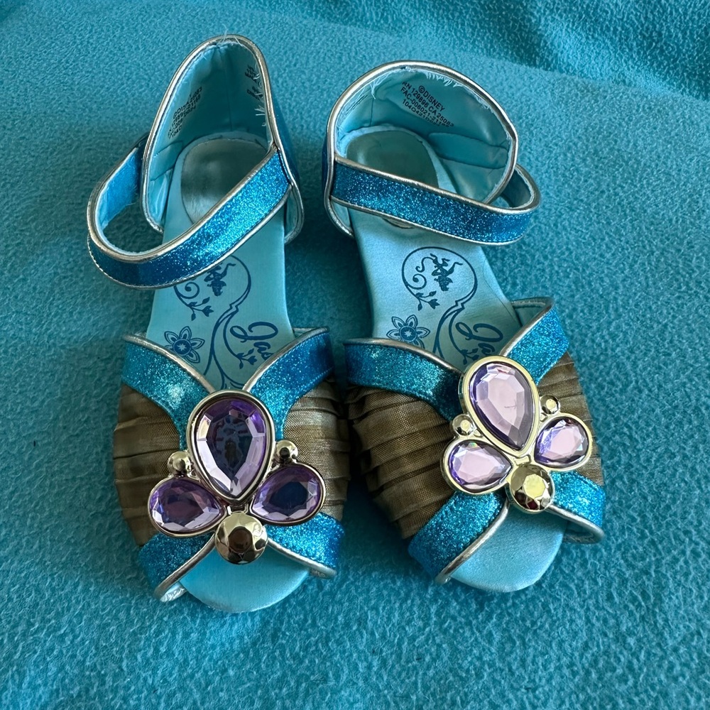 Like New - Disney’s Princess Jasmine’s Sparkly Blue and Purple costume shoes.